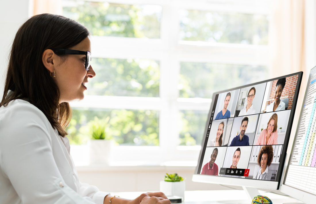 Deal Manager coordinating with specialists across the country during a live deal